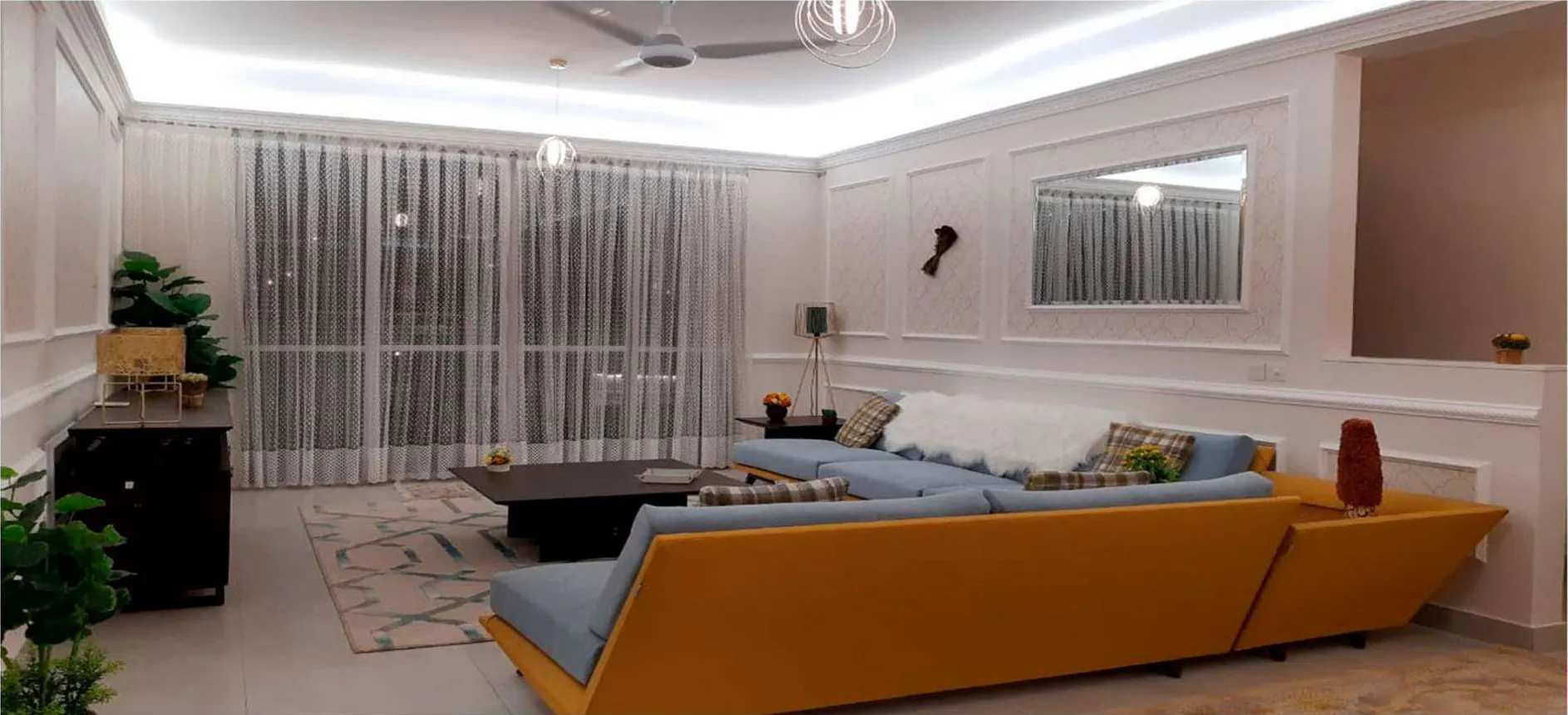 TV lounge — picture of an existing apartment at Lakhani Presidency